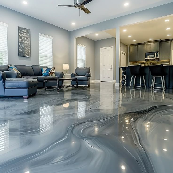 Modern living room with glossy resin rich floors featuring grey metallic residential epoxy flooring in Melbourne.