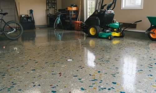 Epoxy chip flooring in Melbourne with blue, muted, and maroon chips durable resin rich floors for homes and commercial spaces.