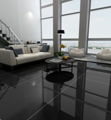 Residential epoxy flooring in Melbourne – glossy resin rich floors in black colour for luxury living rooms.